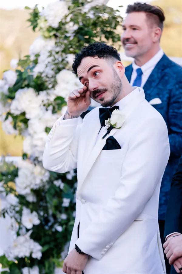 Tearful groom at wedding ceremony