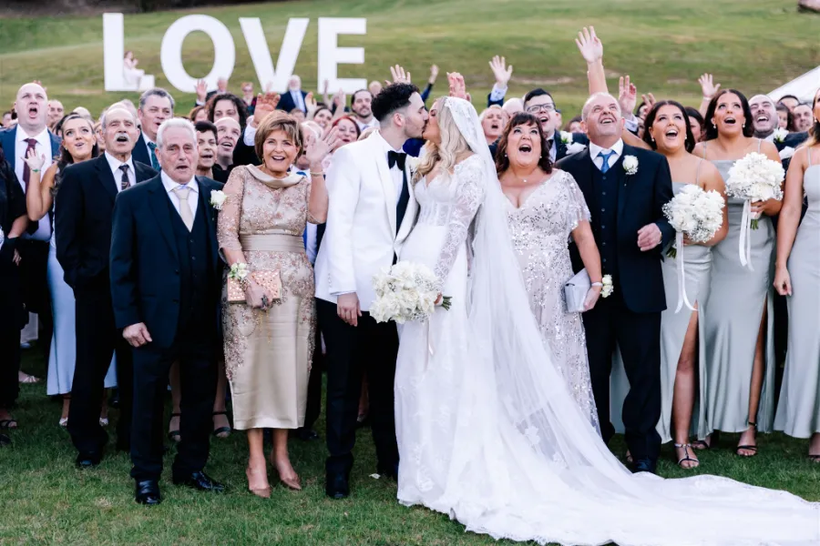 Angela & Carmelo group wedding photo