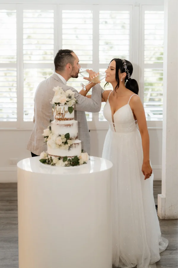 Bride and Groom Wedding Toast Cake Cutting Bride and Groom Wedding Toast Cake Cutting