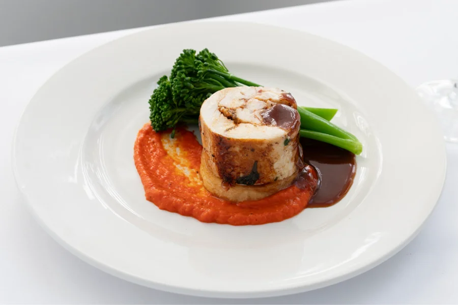 Chicken Ballotine Potato fondant - Roasted capsicum puree - Steamed broccolini Chicken Ballotine Potato fondant - Roasted capsicum puree - Steamed broccolini