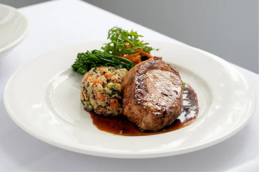 Sichuan Pepper Pork Striploin Lime braised tri-quinoa – Steamed broccolini – Wild berry jus Sichuan Pepper Pork Striploin Lime braised tri-quinoa – Steamed broccolini – Wild berry jus