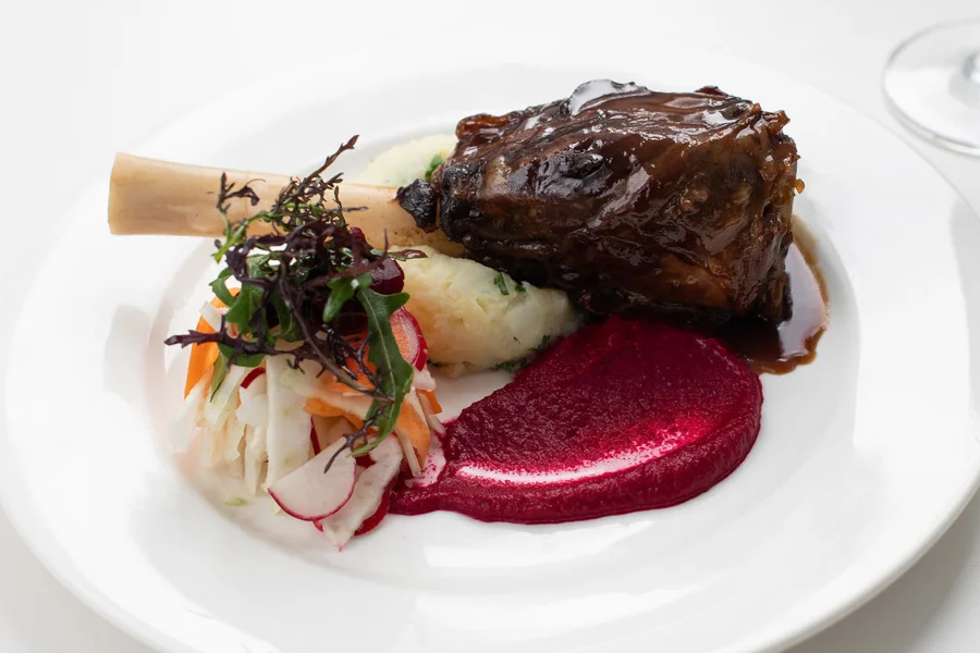 Marsala Braised Lamb Shank Idaho potato & celeriac mash - Roast beet puree - Rosemary jus Marsala Braised Lamb Shank Idaho potato & celeriac mash - Roast beet puree - Rosemary jus