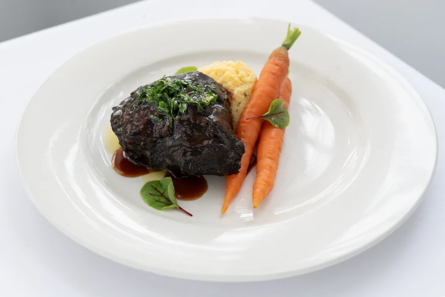 Charred Beef Cheek Creamy polenta - Steamed Dutch carrots - Gremolata Charred Beef Cheek Creamy polenta - Steamed Dutch carrots - Gremolata