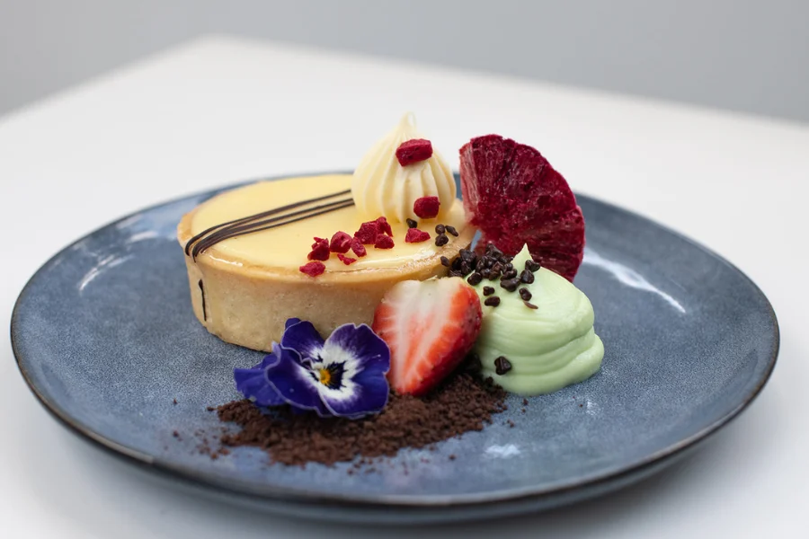 Lemon Tart (NF) Dehydrated blood orange – Dark chocolate peta crispies – Midori cream Lemon Tart (NF) Dehydrated blood orange – Dark chocolate peta crispies – Midori cream