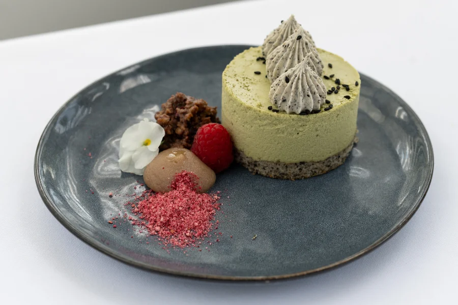 Black Sesame Green Tea Mousse (NF) Macerated boysenberry and apple – Davidson plum and chocolate crumb – Milk tea glaze Black Sesame Green Tea Mousse (NF) Macerated boysenberry and apple – Davidson plum and chocolate crumb – Milk tea glaze