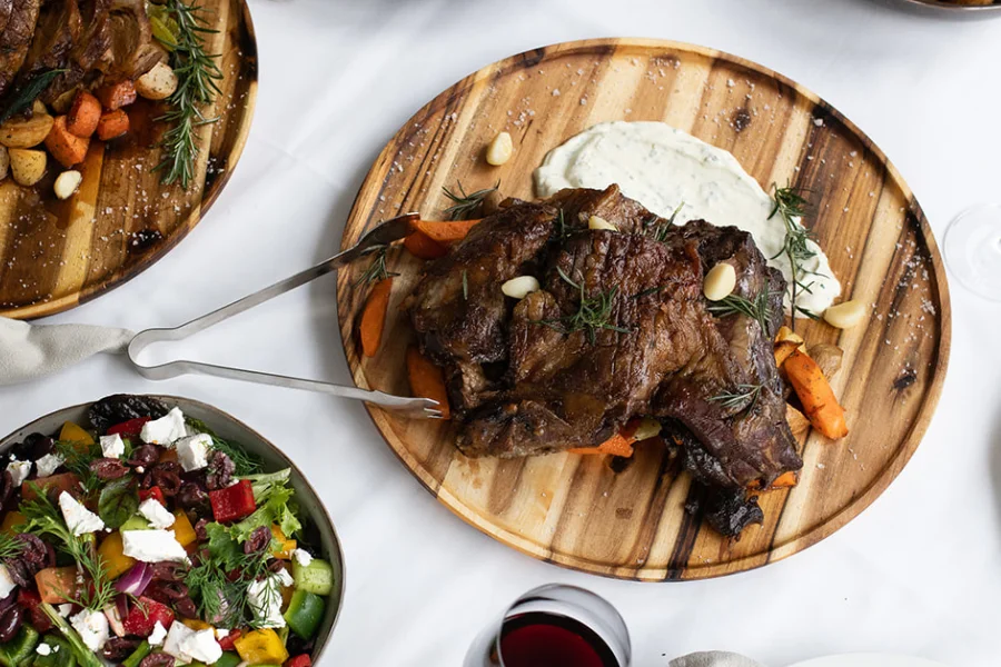 Slow Roasted Lamb Shoulder Mint tzatziki – Confit garlic – Fried rosemary – Maldon sea salt flakes (GF/NF) Slow Roasted Lamb Shoulder Mint tzatziki – Confit garlic – Fried rosemary – Maldon sea salt flakes (GF/NF)