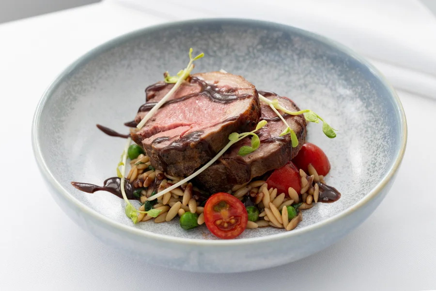 Lamb Noisette Sage butter - Orzo pasta - Mini Roma tomatoes - Garden peas Lamb Noisette Sage butter - Orzo pasta - Mini Roma tomatoes - Garden peas