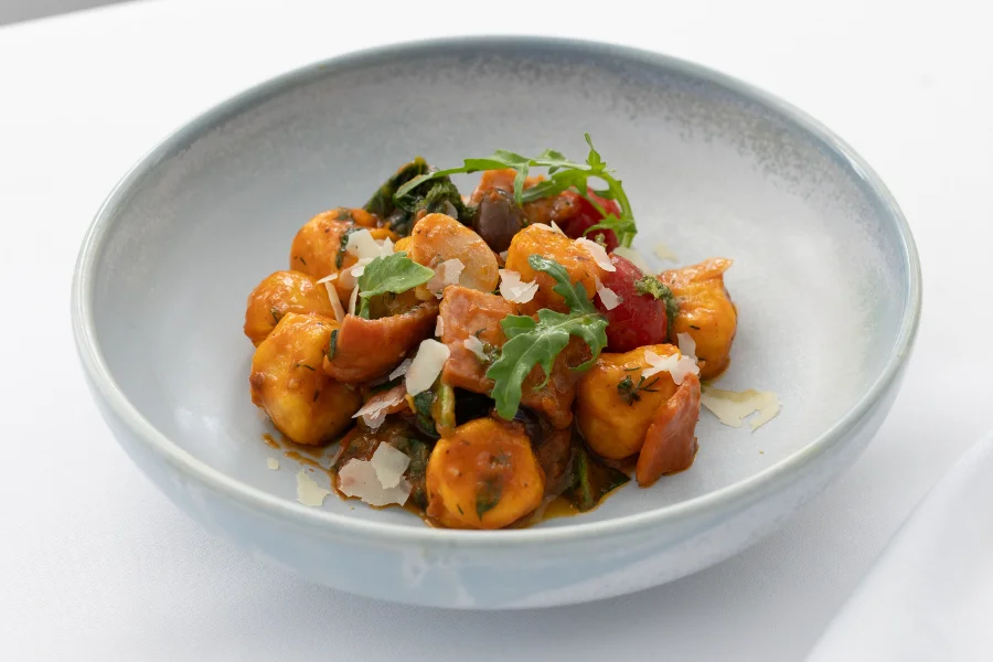Pumpkin Gnocchi Bacon - Anchovies - Garlic - Medley of tomatoes - Kalamata olives - Capers Pumpkin Gnocchi Bacon - Anchovies - Garlic - Medley of tomatoes - Kalamata olives - Capers