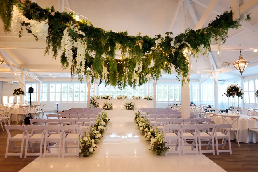 Indoor Wedding Ceremony with Greenery