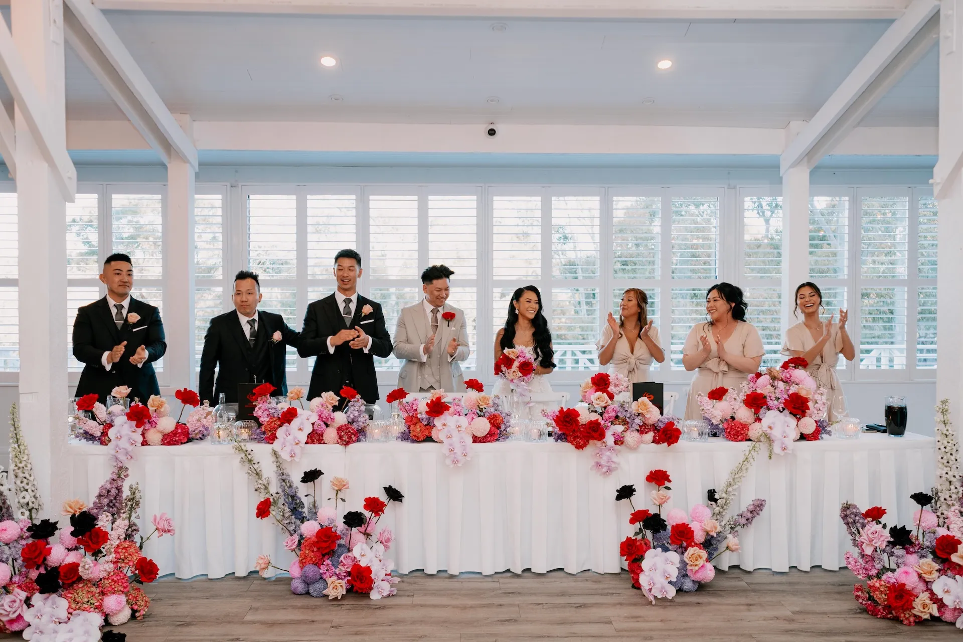 Asian wedding bridal table with bright florals at Bramleigh Estate